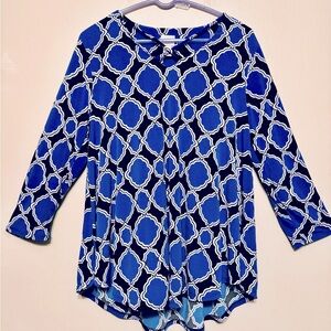 LAST CHANCE - Long sleeved blue patterned blouse.